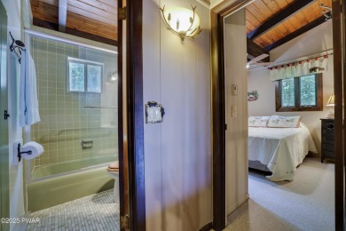 Welcome to your serene lakeside retreat in the highly desirable on Paupack Hills Golf and Country Club in Pennsylvania - for sale on GolfHomes.com, golf home, golf lot