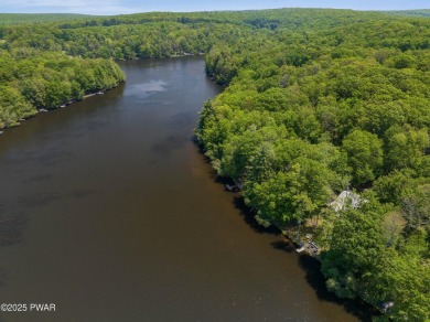 Welcome to your serene lakeside retreat in the highly desirable on Paupack Hills Golf and Country Club in Pennsylvania - for sale on GolfHomes.com, golf home, golf lot