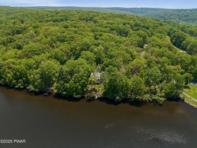 Welcome to your serene lakeside retreat in the highly desirable on Paupack Hills Golf and Country Club in Pennsylvania - for sale on GolfHomes.com, golf home, golf lot