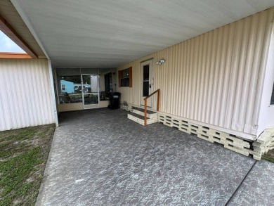 Priced to Sell in Hidden Golf - A Highly Sought-After 55+ Gated on Lake Henry Golf Club in Florida - for sale on GolfHomes.com, golf home, golf lot