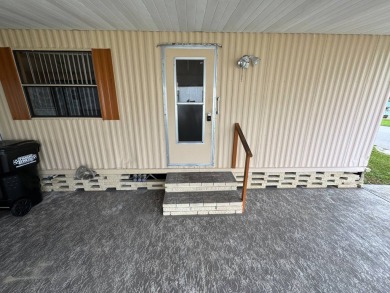 Priced to Sell in Hidden Golf - A Highly Sought-After 55+ Gated on Lake Henry Golf Club in Florida - for sale on GolfHomes.com, golf home, golf lot