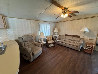Priced to Sell in Hidden Golf - A Highly Sought-After 55+ Gated on Lake Henry Golf Club in Florida - for sale on GolfHomes.com, golf home, golf lot