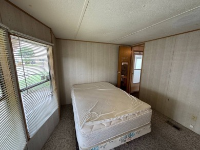 Priced to Sell in Hidden Golf - A Highly Sought-After 55+ Gated on Lake Henry Golf Club in Florida - for sale on GolfHomes.com, golf home, golf lot