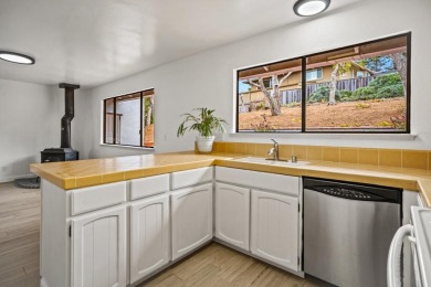 Opportunity awaits at this 4-bedroom, 2.5-bathroom home nestled on Monterey Peninsula Golf and Country Club in California - for sale on GolfHomes.com, golf home, golf lot