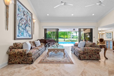 Welcome to 10984 Boca Woods Lane, an exquisite residence nestled on Boca Woods Country Club in Florida - for sale on GolfHomes.com, golf home, golf lot