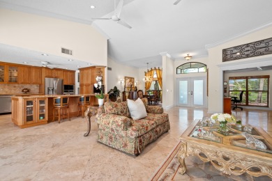 Welcome to 10984 Boca Woods Lane, an exquisite residence nestled on Boca Woods Country Club in Florida - for sale on GolfHomes.com, golf home, golf lot