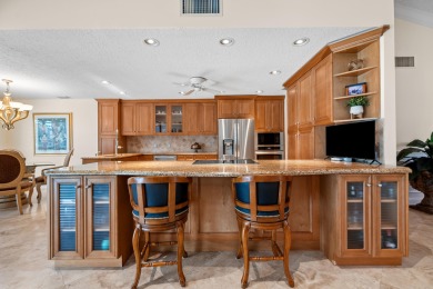 Welcome to 10984 Boca Woods Lane, an exquisite residence nestled on Boca Woods Country Club in Florida - for sale on GolfHomes.com, golf home, golf lot
