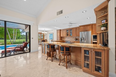 Welcome to 10984 Boca Woods Lane, an exquisite residence nestled on Boca Woods Country Club in Florida - for sale on GolfHomes.com, golf home, golf lot