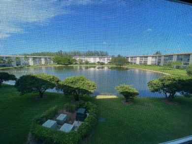WATER VIEW! 2 BED, 2 BATH GROUND FLOOR UNIT. WASHER AND DRYER on Inverrary Country Club in Florida - for sale on GolfHomes.com, golf home, golf lot