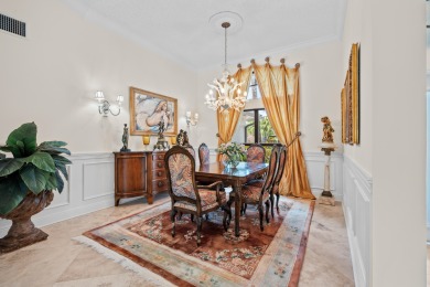 Welcome to 10984 Boca Woods Lane, an exquisite residence nestled on Boca Woods Country Club in Florida - for sale on GolfHomes.com, golf home, golf lot