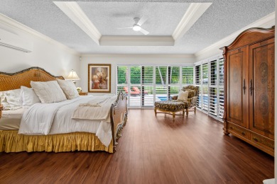 Welcome to 10984 Boca Woods Lane, an exquisite residence nestled on Boca Woods Country Club in Florida - for sale on GolfHomes.com, golf home, golf lot