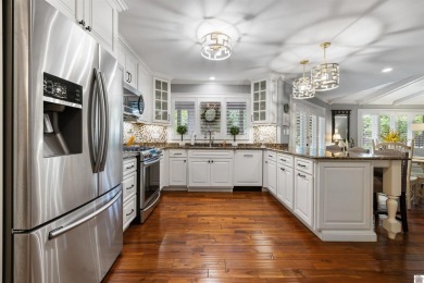 Welcome to this updated and pristine 3-bedroom 2.5-bathroom on Country Club of Paducah in Kentucky - for sale on GolfHomes.com, golf home, golf lot