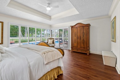Welcome to 10984 Boca Woods Lane, an exquisite residence nestled on Boca Woods Country Club in Florida - for sale on GolfHomes.com, golf home, golf lot
