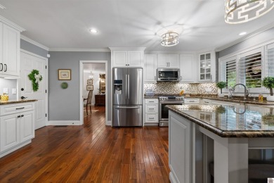 Welcome to this updated and pristine 3-bedroom 2.5-bathroom on Country Club of Paducah in Kentucky - for sale on GolfHomes.com, golf home, golf lot