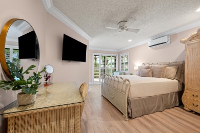 Welcome to 10984 Boca Woods Lane, an exquisite residence nestled on Boca Woods Country Club in Florida - for sale on GolfHomes.com, golf home, golf lot