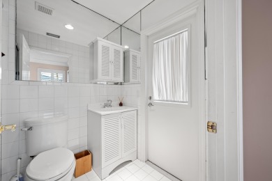 Welcome to 10984 Boca Woods Lane, an exquisite residence nestled on Boca Woods Country Club in Florida - for sale on GolfHomes.com, golf home, golf lot