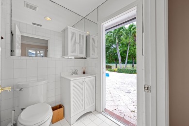 Welcome to 10984 Boca Woods Lane, an exquisite residence nestled on Boca Woods Country Club in Florida - for sale on GolfHomes.com, golf home, golf lot