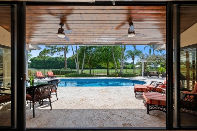 Welcome to 10984 Boca Woods Lane, an exquisite residence nestled on Boca Woods Country Club in Florida - for sale on GolfHomes.com, golf home, golf lot