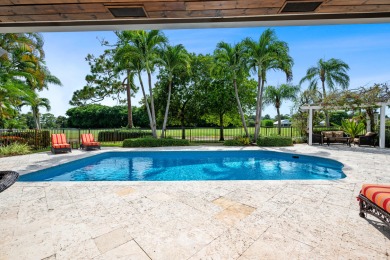 Welcome to 10984 Boca Woods Lane, an exquisite residence nestled on Boca Woods Country Club in Florida - for sale on GolfHomes.com, golf home, golf lot