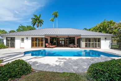 Welcome to 10984 Boca Woods Lane, an exquisite residence nestled on Boca Woods Country Club in Florida - for sale on GolfHomes.com, golf home, golf lot