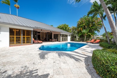 Welcome to 10984 Boca Woods Lane, an exquisite residence nestled on Boca Woods Country Club in Florida - for sale on GolfHomes.com, golf home, golf lot