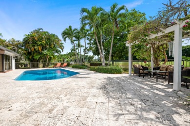 Welcome to 10984 Boca Woods Lane, an exquisite residence nestled on Boca Woods Country Club in Florida - for sale on GolfHomes.com, golf home, golf lot