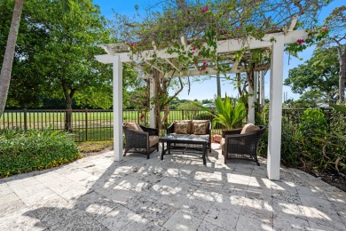 Welcome to 10984 Boca Woods Lane, an exquisite residence nestled on Boca Woods Country Club in Florida - for sale on GolfHomes.com, golf home, golf lot