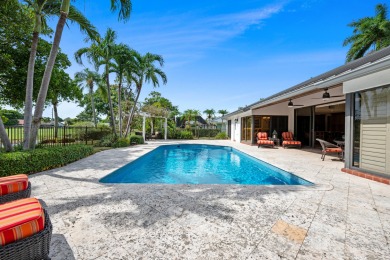 Welcome to 10984 Boca Woods Lane, an exquisite residence nestled on Boca Woods Country Club in Florida - for sale on GolfHomes.com, golf home, golf lot