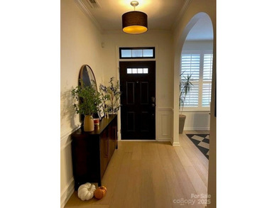 This beautifully renovated townhouse, offers modern living at on Tega Cay Golf Club in South Carolina - for sale on GolfHomes.com, golf home, golf lot