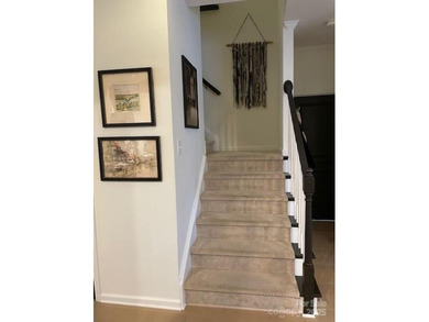 This beautifully renovated townhouse, offers modern living at on Tega Cay Golf Club in South Carolina - for sale on GolfHomes.com, golf home, golf lot