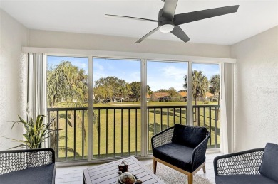 Discover this STUNNING 2-bedroom, 2-bathroom Second-floor condo on Peridia Golf and Country Club in Florida - for sale on GolfHomes.com, golf home, golf lot