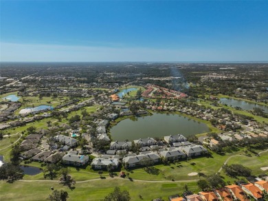 Discover this STUNNING 2-bedroom, 2-bathroom Second-floor condo on Peridia Golf and Country Club in Florida - for sale on GolfHomes.com, golf home, golf lot