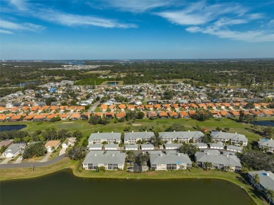 Discover this STUNNING 2-bedroom, 2-bathroom Second-floor condo on Peridia Golf and Country Club in Florida - for sale on GolfHomes.com, golf home, golf lot