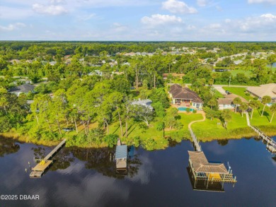 Beautifully updated 3 bed, 2 bath waterfront home with on New Smyrna Beach Golf Course in Florida - for sale on GolfHomes.com, golf home, golf lot