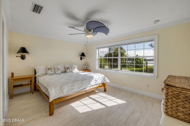Beautifully updated 3 bed, 2 bath waterfront home with on New Smyrna Beach Golf Course in Florida - for sale on GolfHomes.com, golf home, golf lot