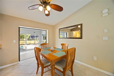 Welcome to this beautifully maintained 2-bedroom, 2-bath pool on Deep Creek Golf Club in Florida - for sale on GolfHomes.com, golf home, golf lot