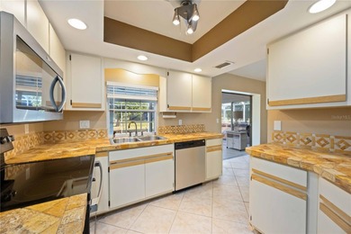 Welcome to this beautifully maintained 2-bedroom, 2-bath pool on Deep Creek Golf Club in Florida - for sale on GolfHomes.com, golf home, golf lot