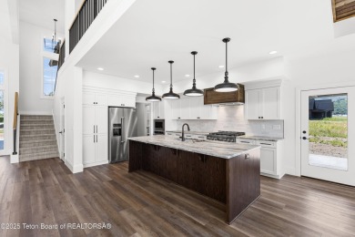 Step into Elevated Living at The Teton Reserve. Positioned along on Teton Reserve in Idaho - for sale on GolfHomes.com, golf home, golf lot