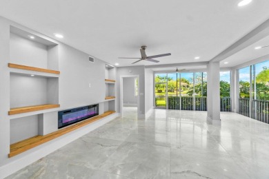 Experience luxury living in this fully renovated first-floor on Polo Club of Boca Raton in Florida - for sale on GolfHomes.com, golf home, golf lot