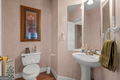 This spacious four-bedroom residence sits on an impressive on Fairfield Plantation Golf and Country Club in Georgia - for sale on GolfHomes.com, golf home, golf lot