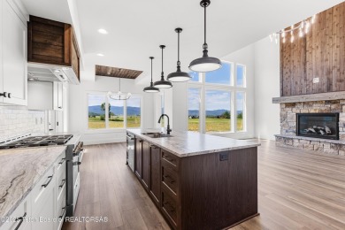 Step into Elevated Living at The Teton Reserve. Positioned along on Teton Reserve in Idaho - for sale on GolfHomes.com, golf home, golf lot