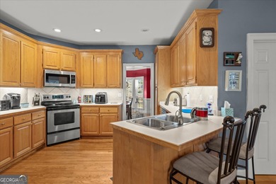 This spacious four-bedroom residence sits on an impressive on Fairfield Plantation Golf and Country Club in Georgia - for sale on GolfHomes.com, golf home, golf lot