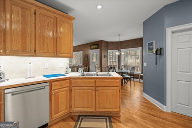 This spacious four-bedroom residence sits on an impressive on Fairfield Plantation Golf and Country Club in Georgia - for sale on GolfHomes.com, golf home, golf lot