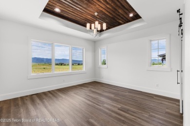Step into Elevated Living at The Teton Reserve. Positioned along on Teton Reserve in Idaho - for sale on GolfHomes.com, golf home, golf lot
