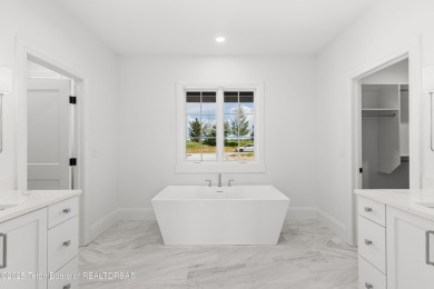 Step into Elevated Living at The Teton Reserve. Positioned along on Teton Reserve in Idaho - for sale on GolfHomes.com, golf home, golf lot