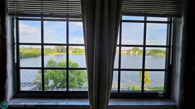Totally updated this Townhome is ready for its new owner. Impact on Pembroke Lakes Golf Club in Florida - for sale on GolfHomes.com, golf home, golf lot