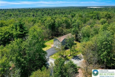Welcome to this expansive 4-bedroom, 2.5-bath colonial offering on Pocono Farms Country Club in Pennsylvania - for sale on GolfHomes.com, golf home, golf lot