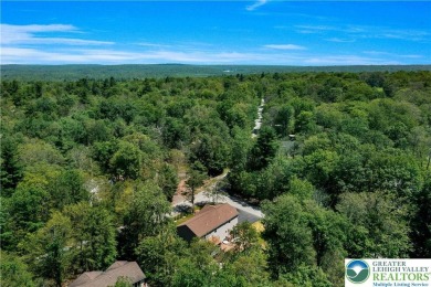 Welcome to this expansive 4-bedroom, 2.5-bath colonial offering on Pocono Farms Country Club in Pennsylvania - for sale on GolfHomes.com, golf home, golf lot