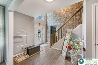 Welcome to this expansive 4-bedroom, 2.5-bath colonial offering on Pocono Farms Country Club in Pennsylvania - for sale on GolfHomes.com, golf home, golf lot