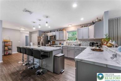 Welcome to this expansive 4-bedroom, 2.5-bath colonial offering on Pocono Farms Country Club in Pennsylvania - for sale on GolfHomes.com, golf home, golf lot